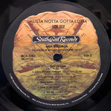 Joe Ely : Musta Notta Gotta Lotta (LP, Album, Pin)