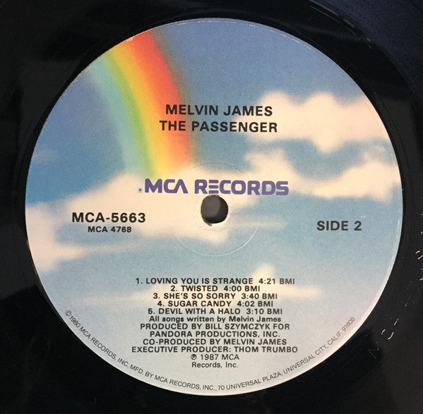Melvin James : The Passenger (LP, Album, Glo)