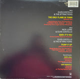 Elvis Costello & The Attractions : The Only Flame In Town (12", Single, Pit)