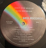 Olivia Newton-John : Don't Stop Believin' (LP, Album, Pin)